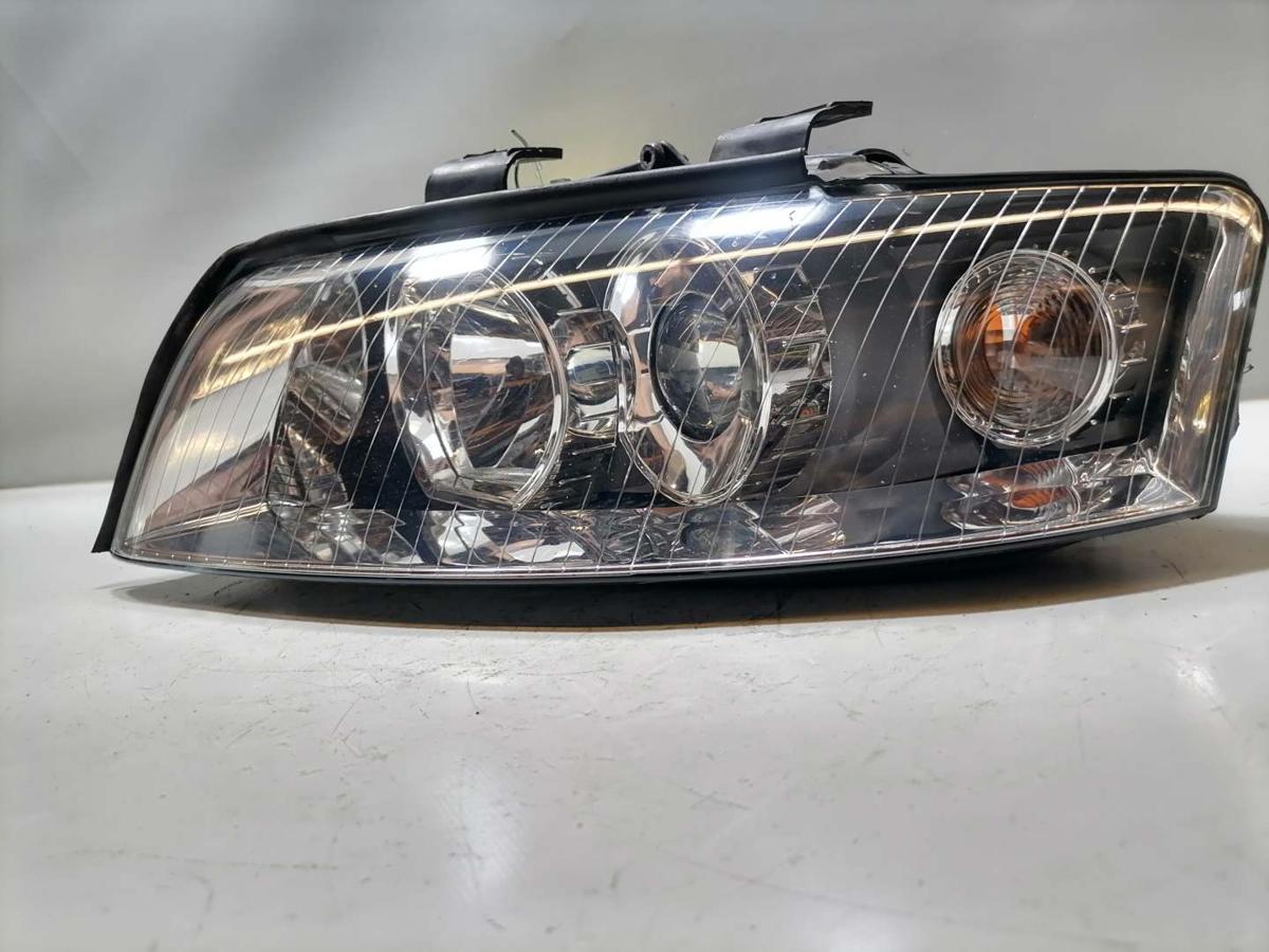 Audi A4 8E B6 original Scheinwerfer vorn links Halogen Bj.2002